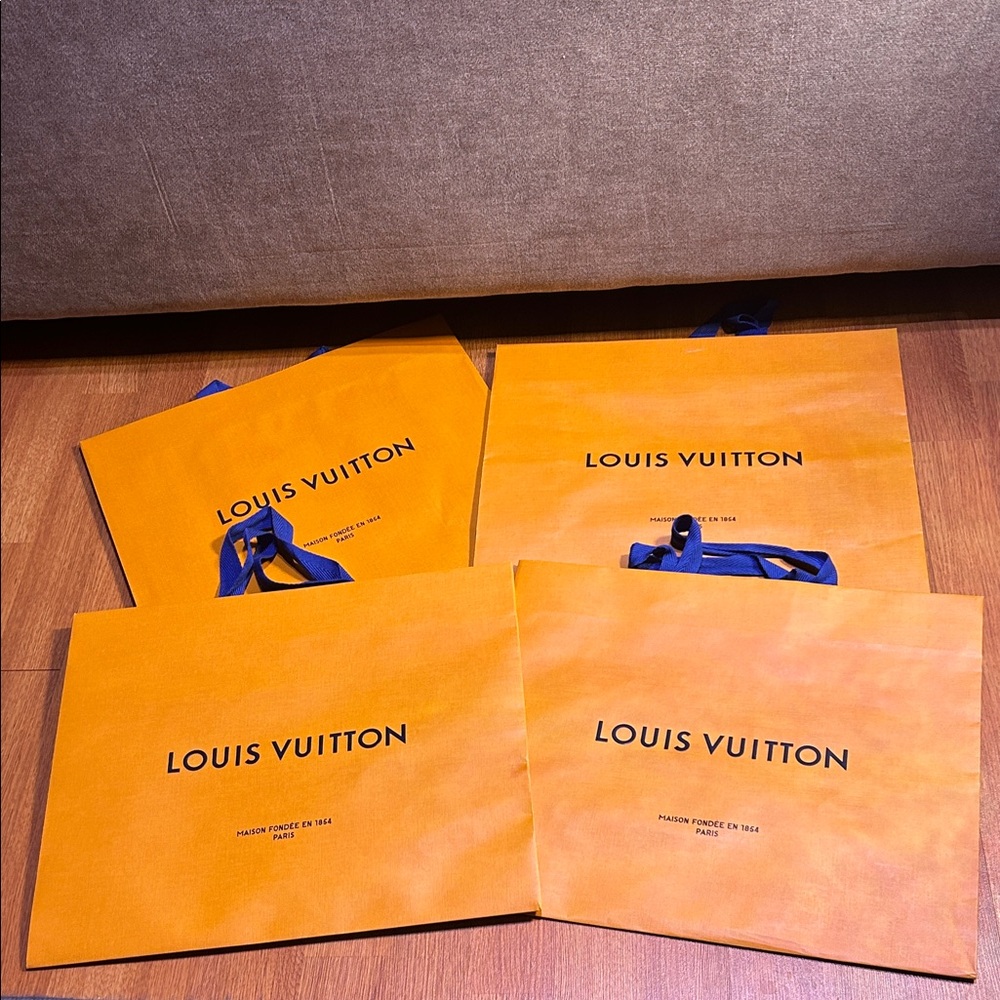 Louis Vuitton Bold Orange Bags with Blue Handles